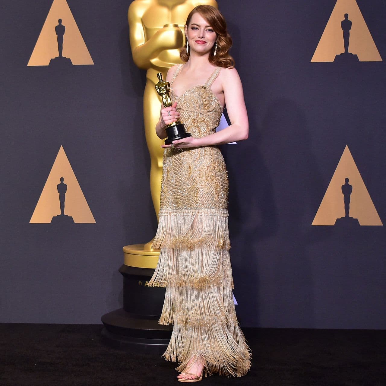  Emma Stone's Oscars Style Evolution, Explained by a Fashion Editor 