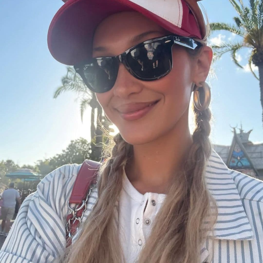 Bella Hadid Styles the Salomon Hiking Sneakers Trend With a Vintage Chanel Tote Bag and The Row White Jeans